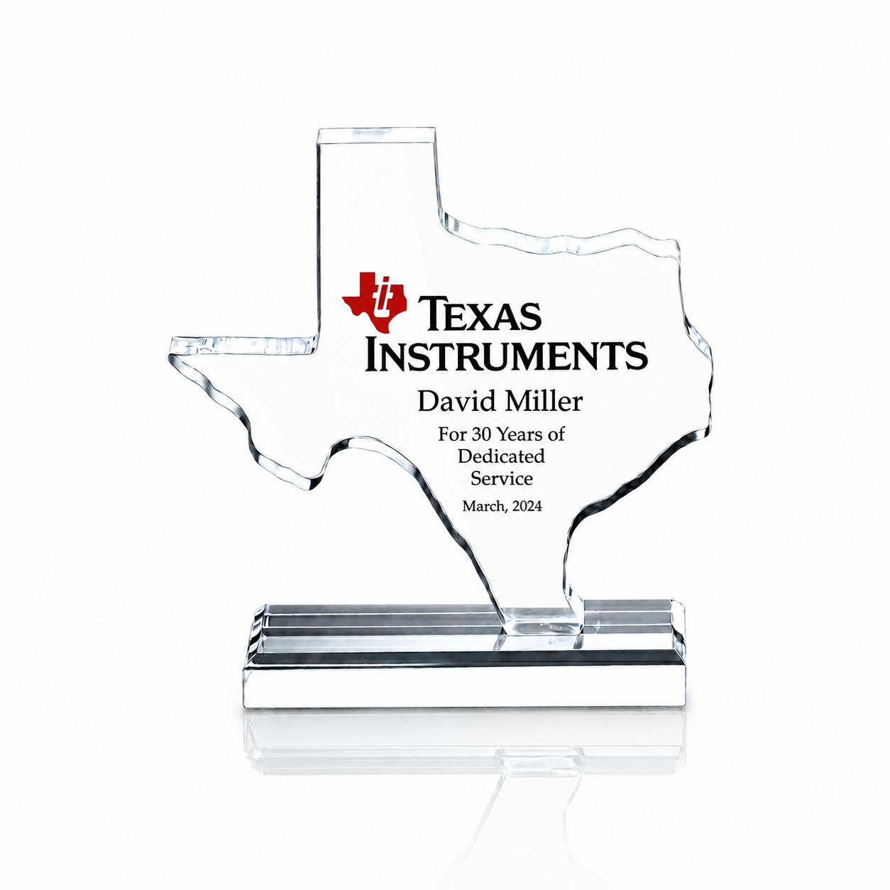 Crystal award in the shape of Texas with engraved text honoring David Miller for 30 years of dedicated service, March 2024, by Texas Instruments.