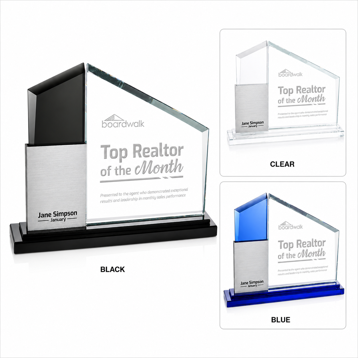 Three glass awards for 'Top Realtor of the Month,' one in black, one clear, and one blue, each with a side panel in a distinct color, engraved with a name and date, displayed on a white background.