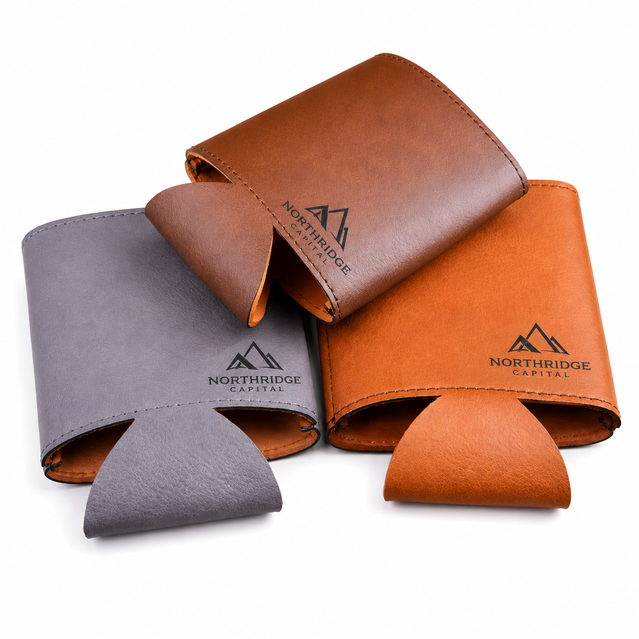 Custom leatherette beverage holders with laser engraved company logos in multiple colors. Personalized drink holders for corporate gifts, promotional products, employee appreciation, trade shows, branded events, and custom business merchandise.