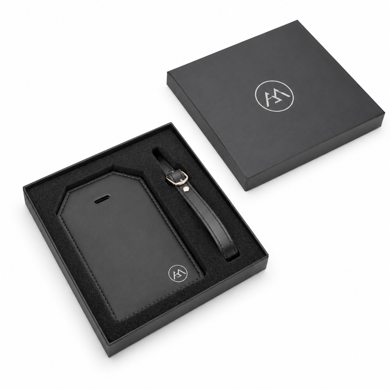 Custom leather luggage tag gift set with matching strap and premium presentation box. Personalized luggage tags for corporate gifts, employee appreciation, client travel gifts, promotional products, conferences, and branded business travel.