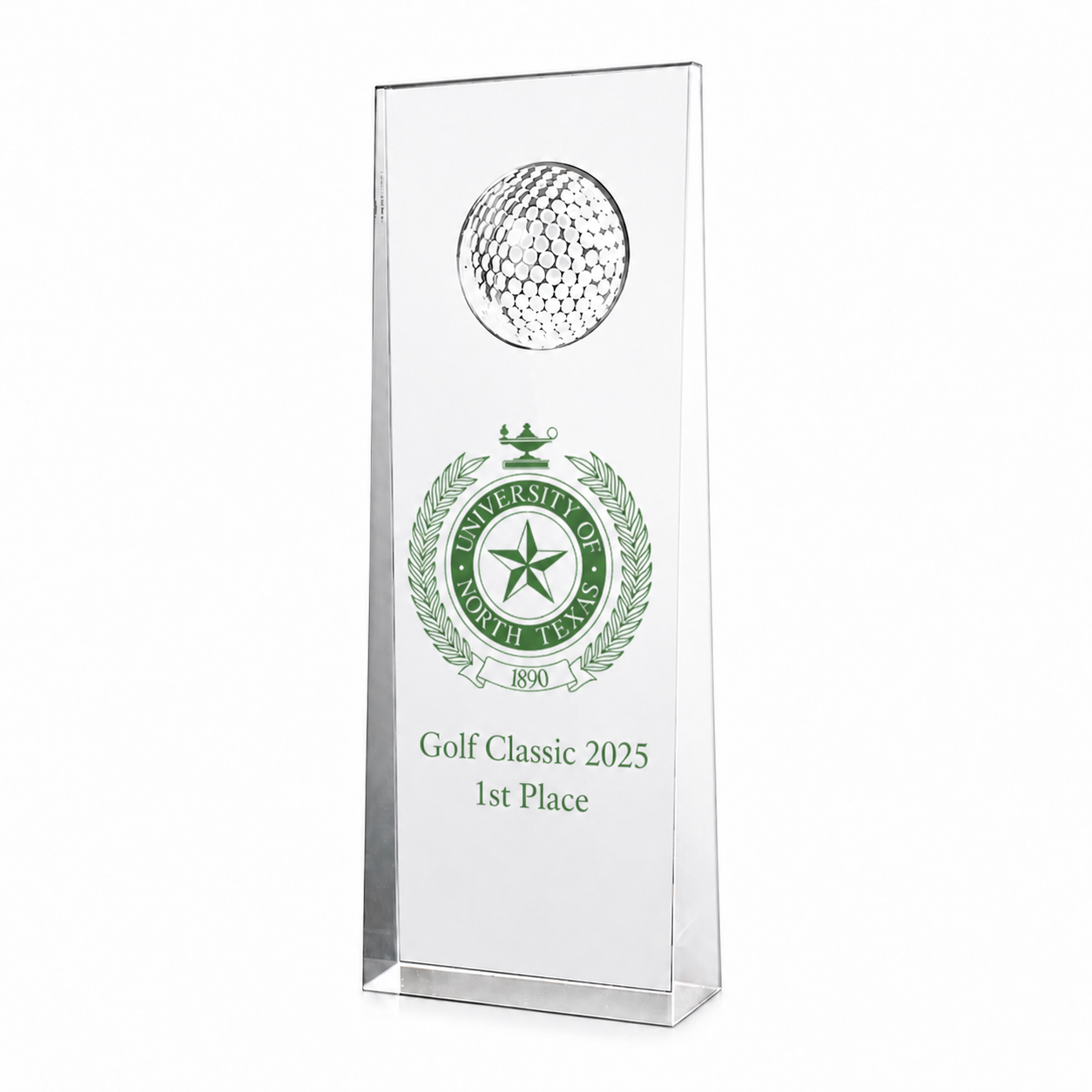 Transparent trophy with university logo, golf classic 2025 first place text, and a golf ball design at the top.