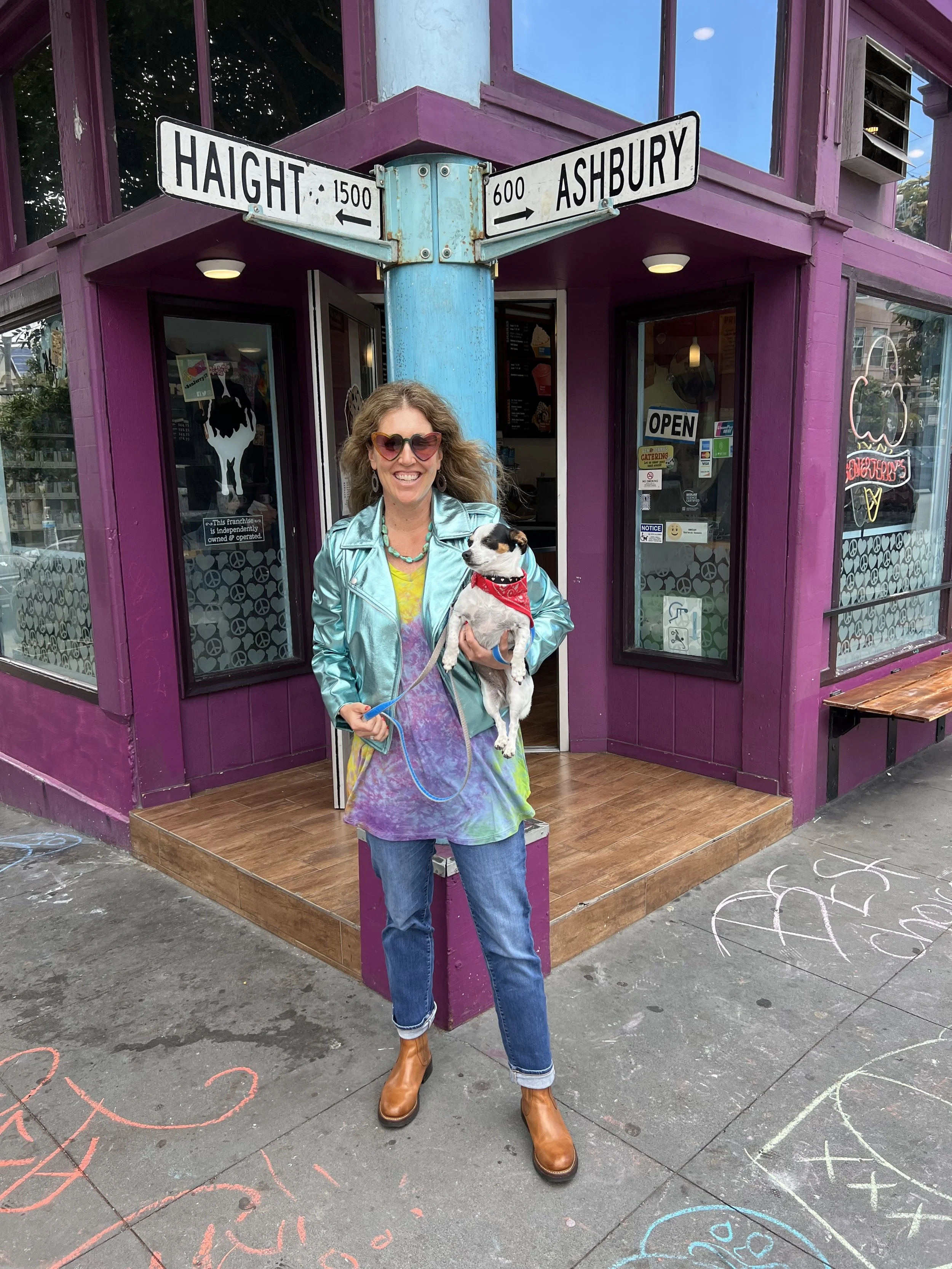 Cynthia Kellogg, a Haight-Ashbury focused real estate agent, standing at the corner of Haight St & Ashbury street