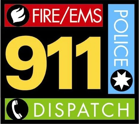 Sign indicating emergency services with fire/EMS, police, and dispatch information.