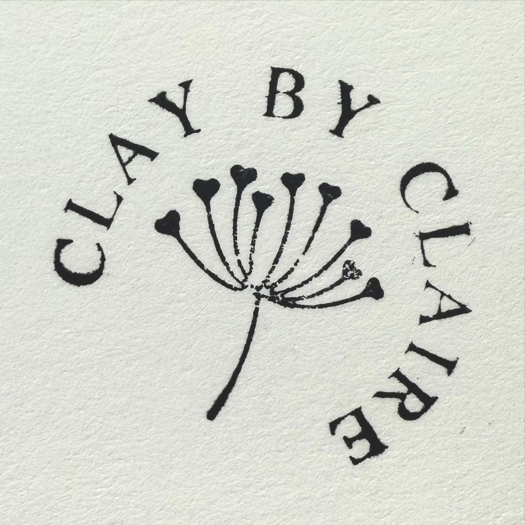 Clay by Claire SF logo and pottery stamp.