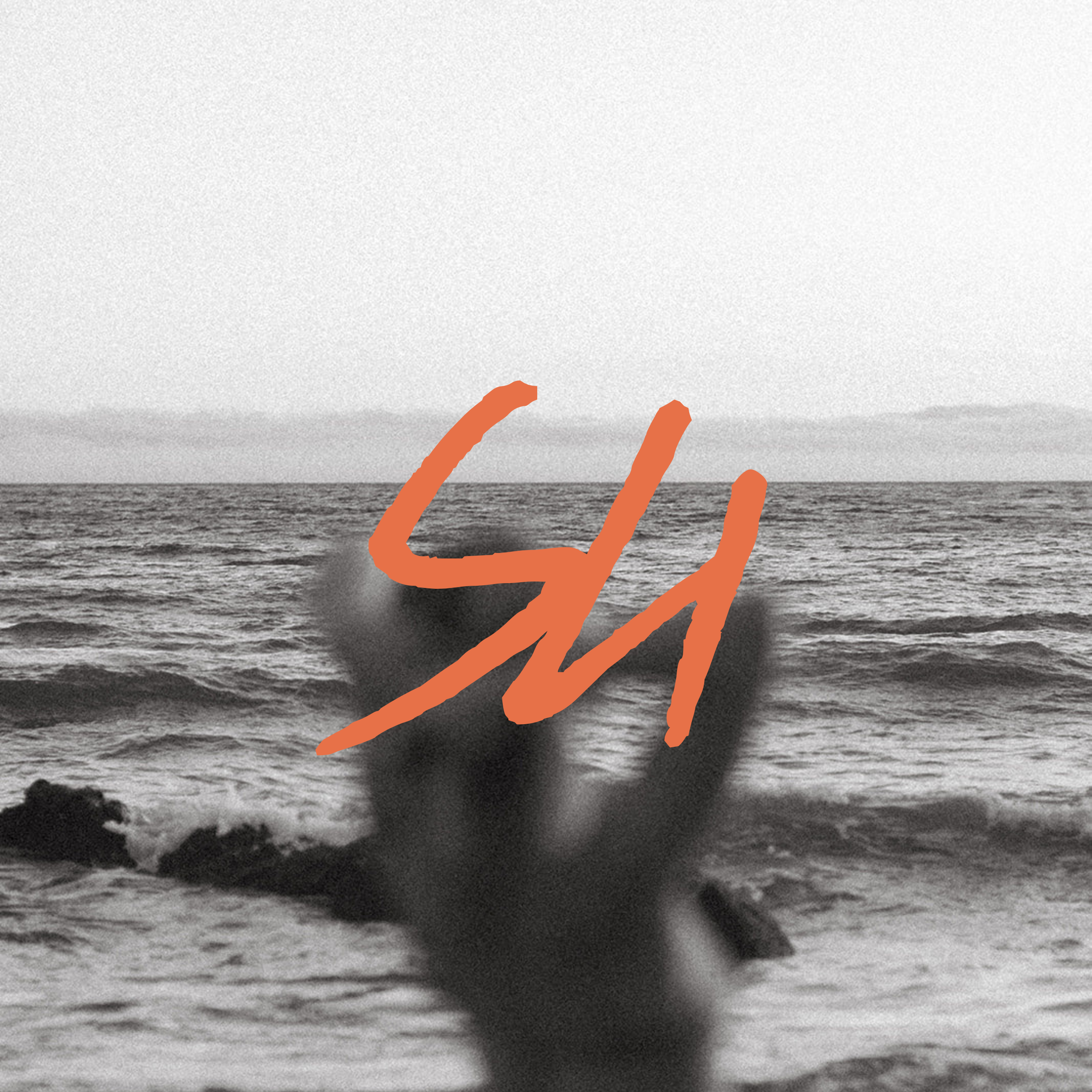 A black and white ocean scene with waves crashing against rocks, overlaid with orange cursive text.