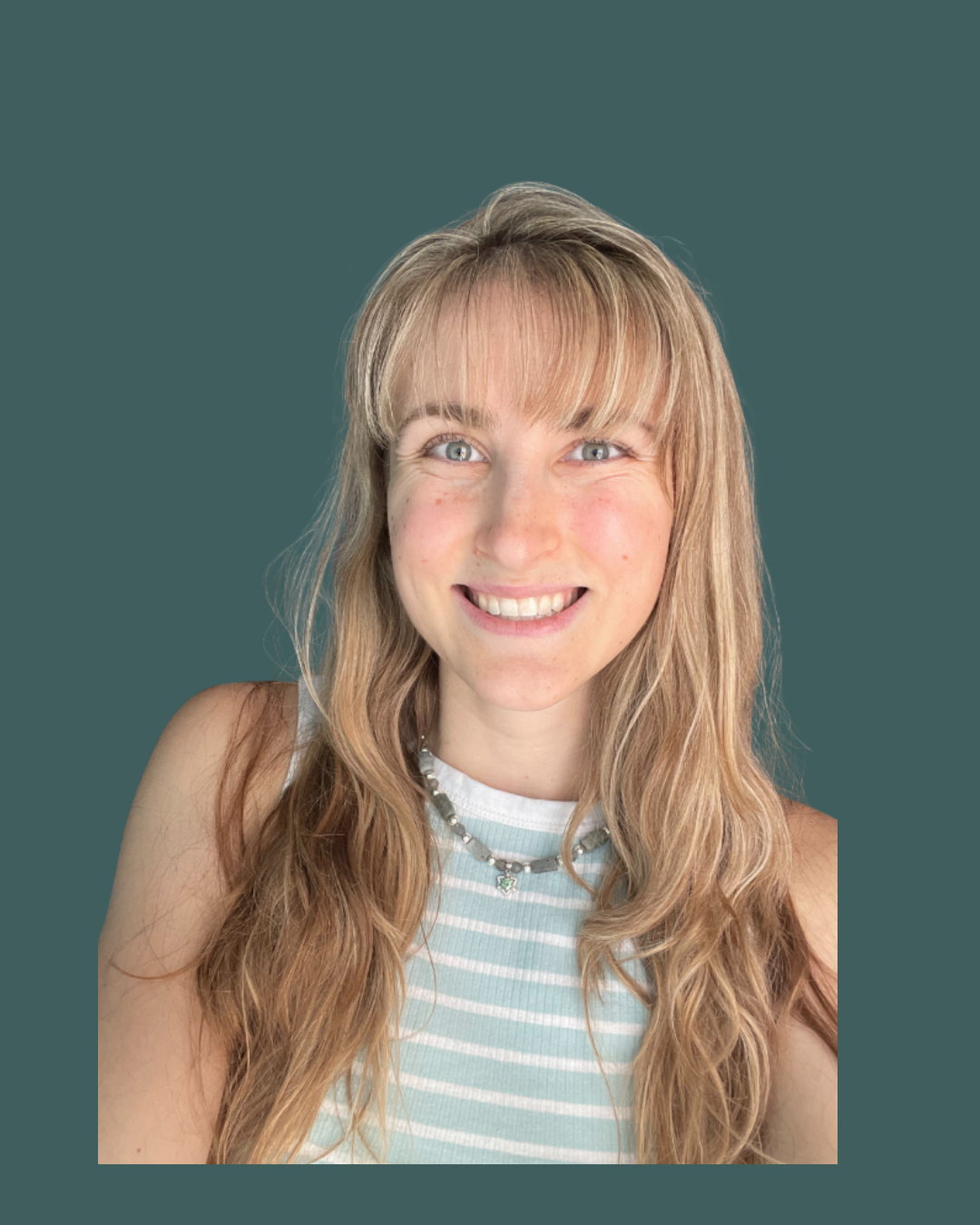 A smiling portrait of Jordan Rolsma, the founder of Rolsma Studio. She is wearing a seafoam green and white shirt, a green stone necklace, and has long blonde hair.