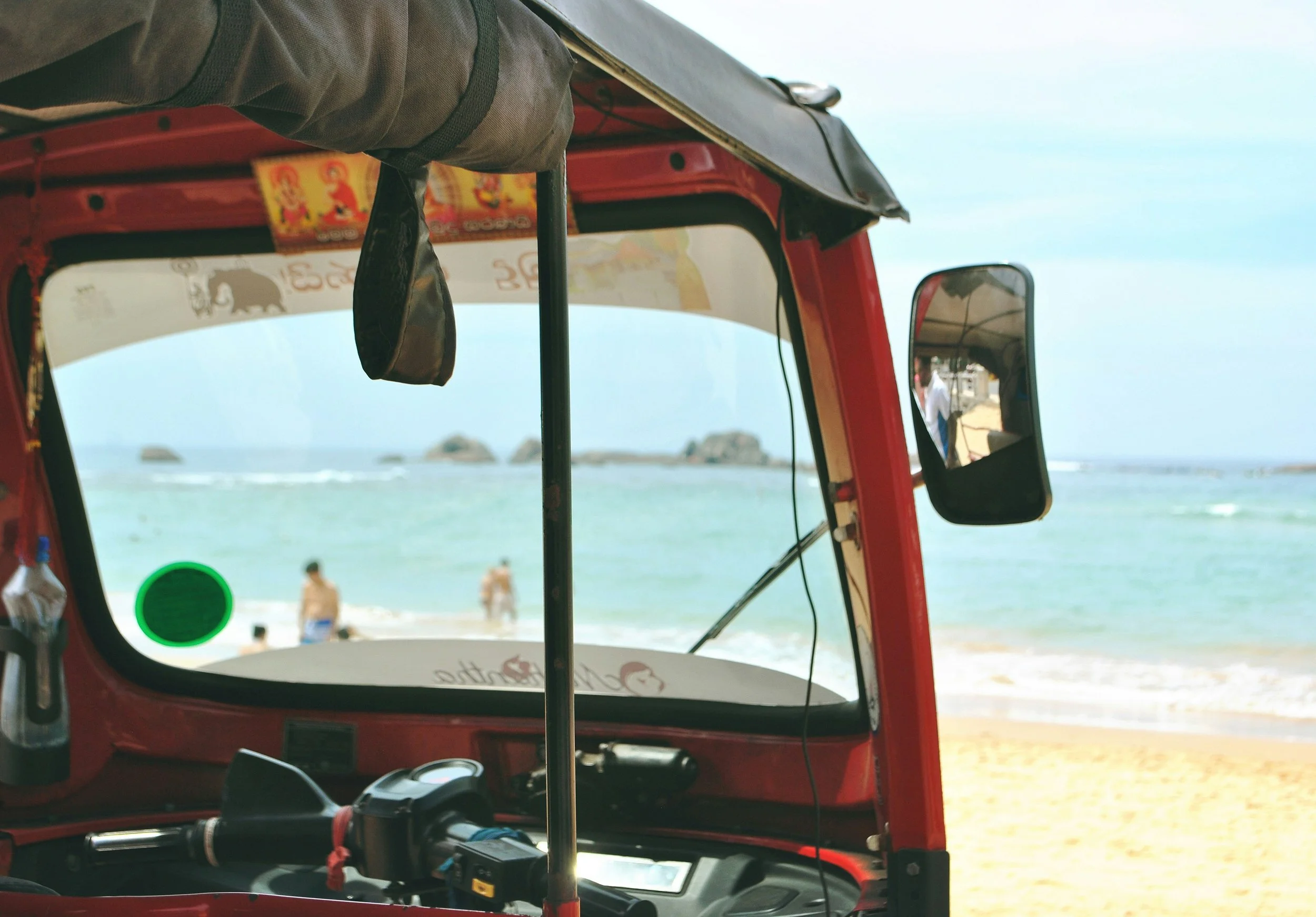 Tuk tuk and ocean view