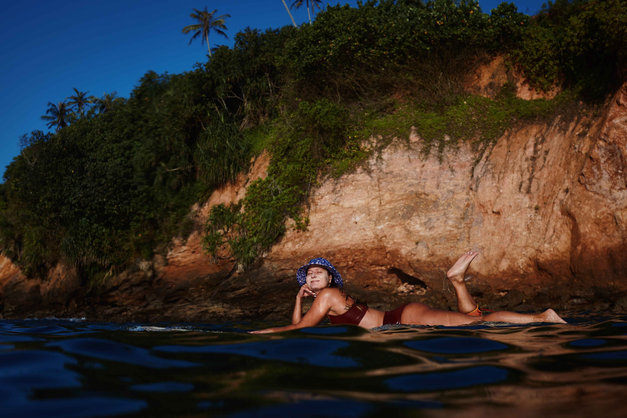 Sarah longboarding at Jungle Beach reef break, Weligama, Sri Lanka