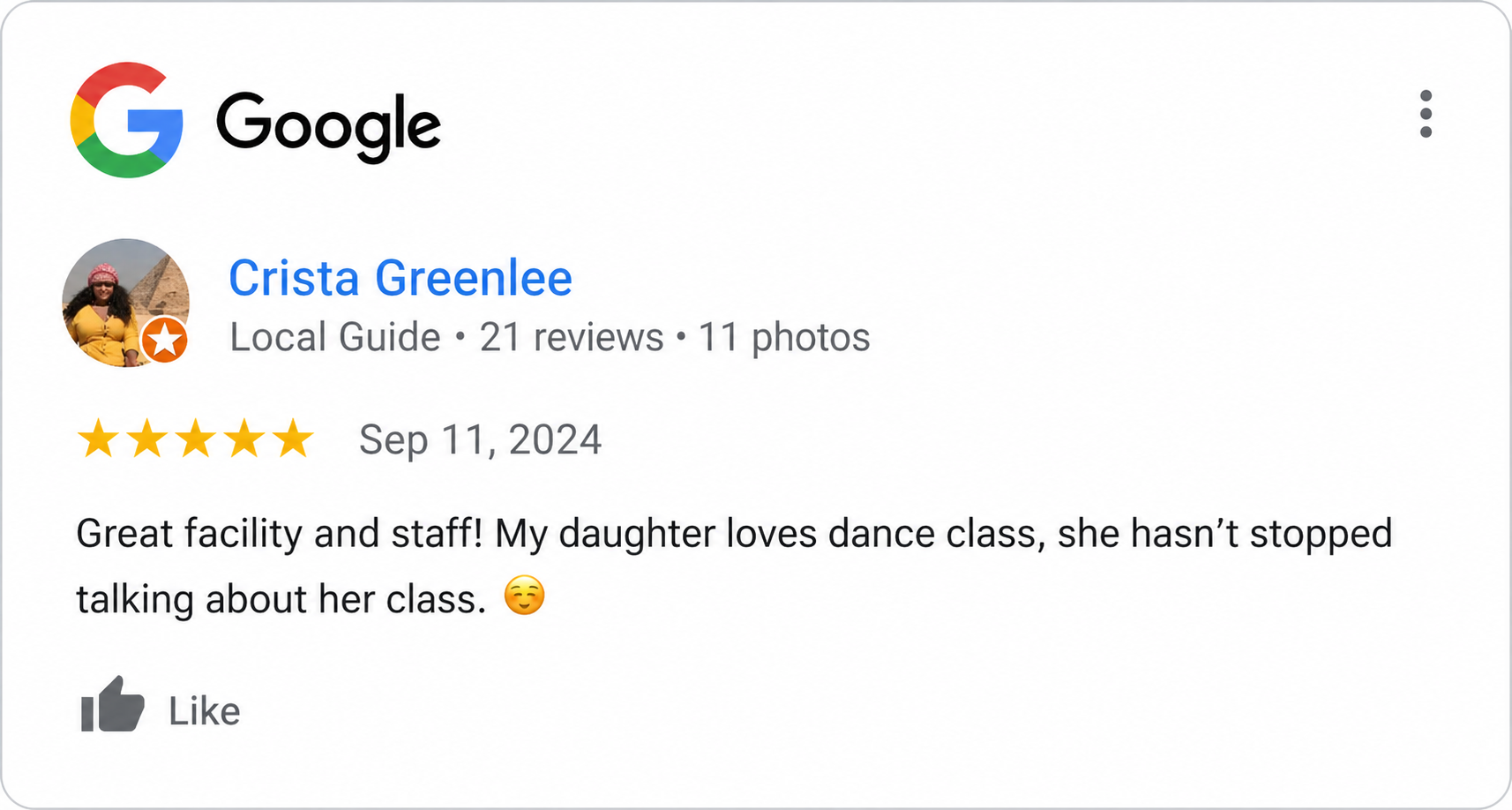 Google review showing a local guide profile named Crista Greenlee with 21 reviews, 11 photos, a profile picture of a woman wearing a pink hat and yellow top, and a five-star rating with a review mentioning a dance class and her daughter.