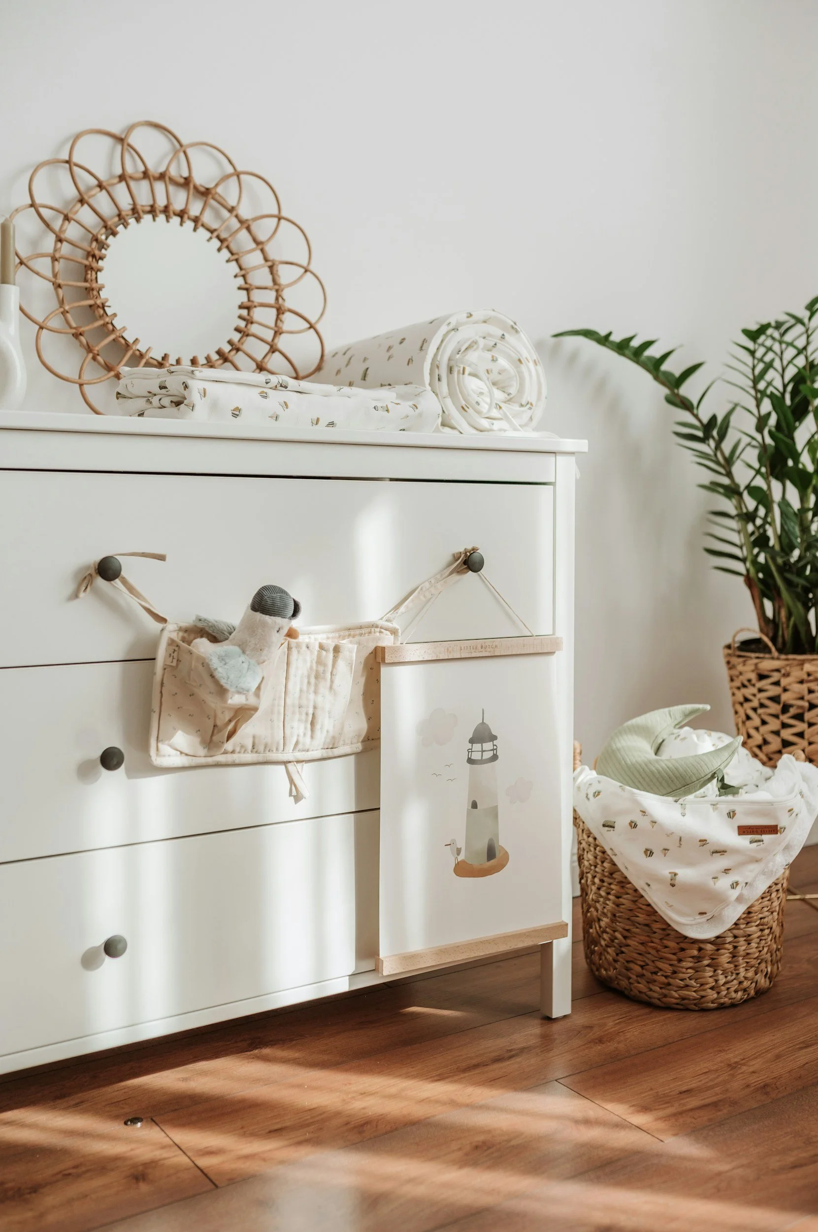 a stylish and organised white nursery