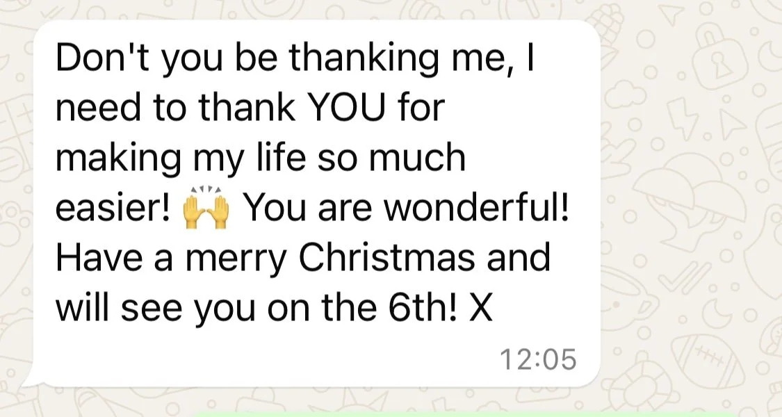 Screenshot of a text message with a Christmas greeting, expressing gratitude and festive wishes for December 6th.