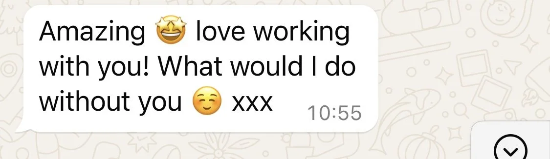 Screenshot of a WhatsApp message expressing love and happiness about working together, with emojis conveying happiness and affection.