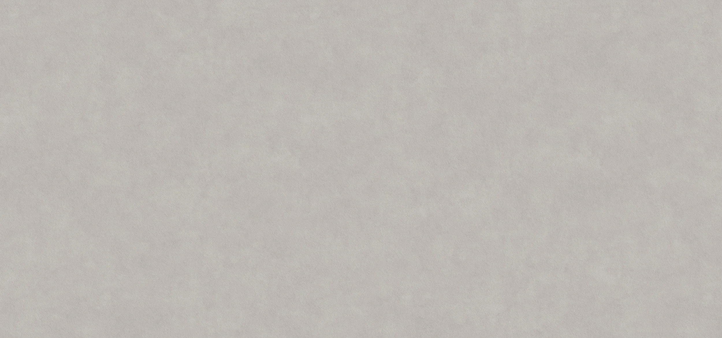 Das Bild zeigt eine schlichte, helle, einfarbige Wand mit einer leichten Textur.