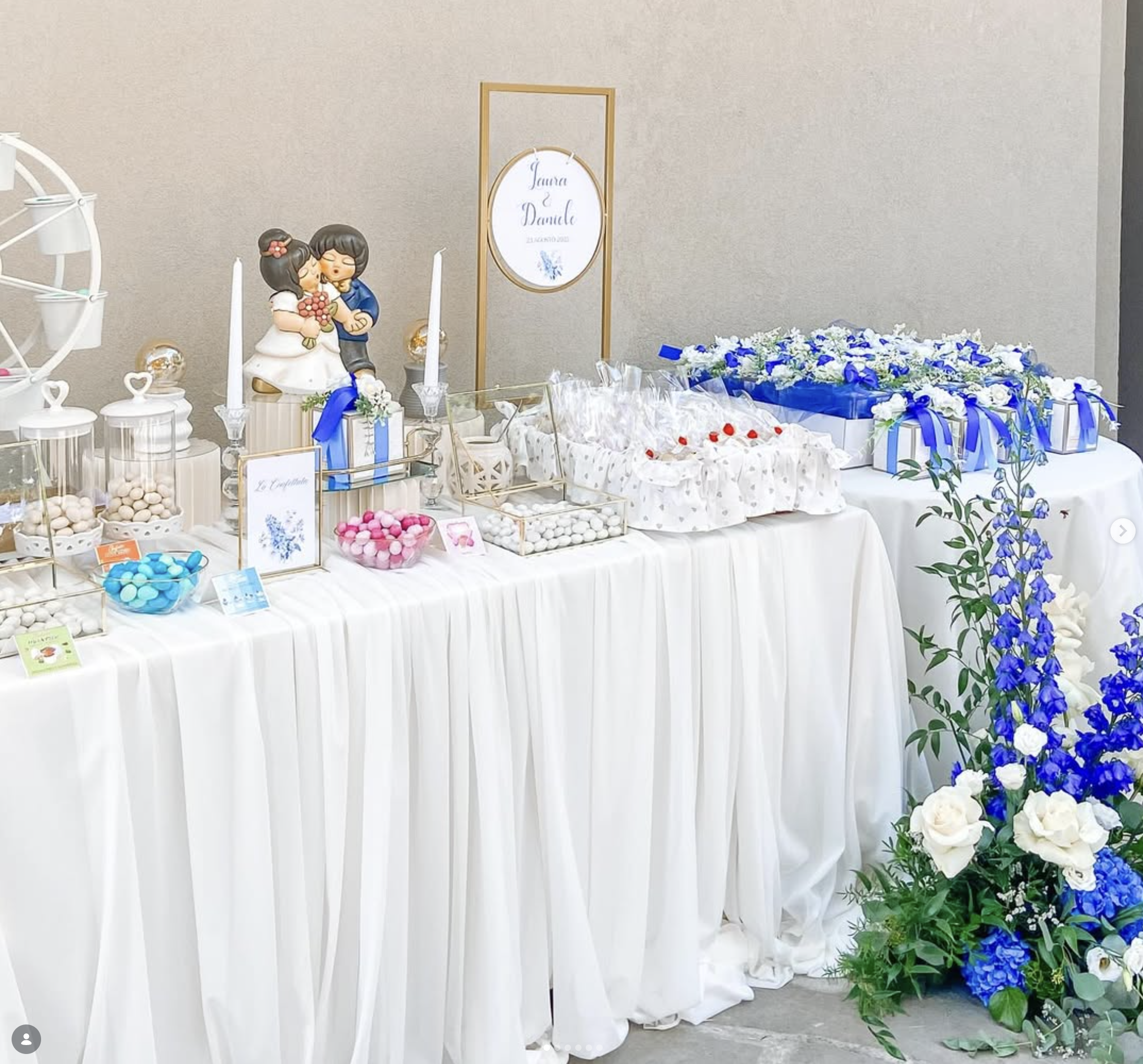 Confettata matrimonio a Bologna con allestimento elegante, fiori e candele