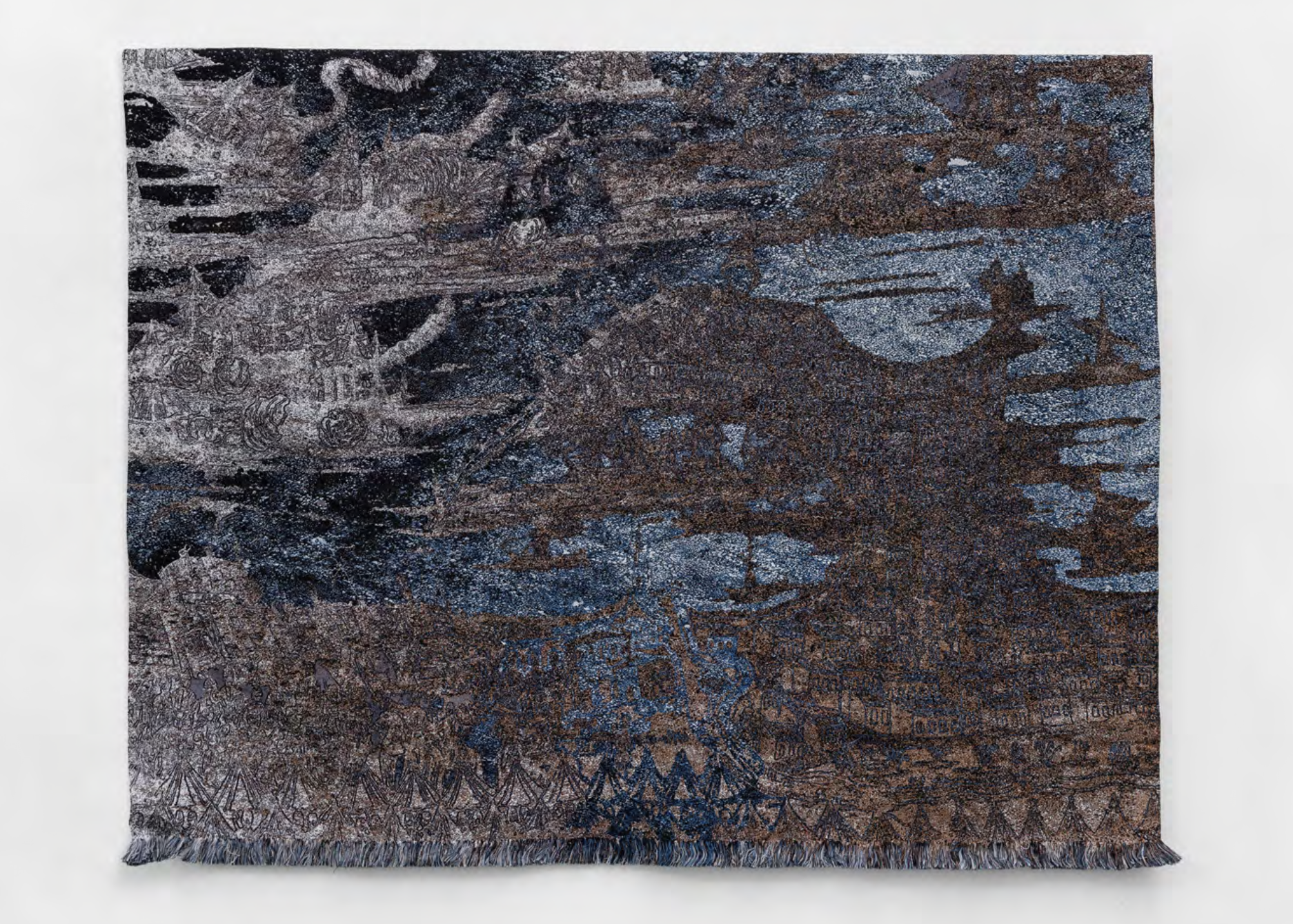 A woven textile art piece with intricate patterns, abstract lines, and a mix of dark and metallic colors, displayed on a white wall.