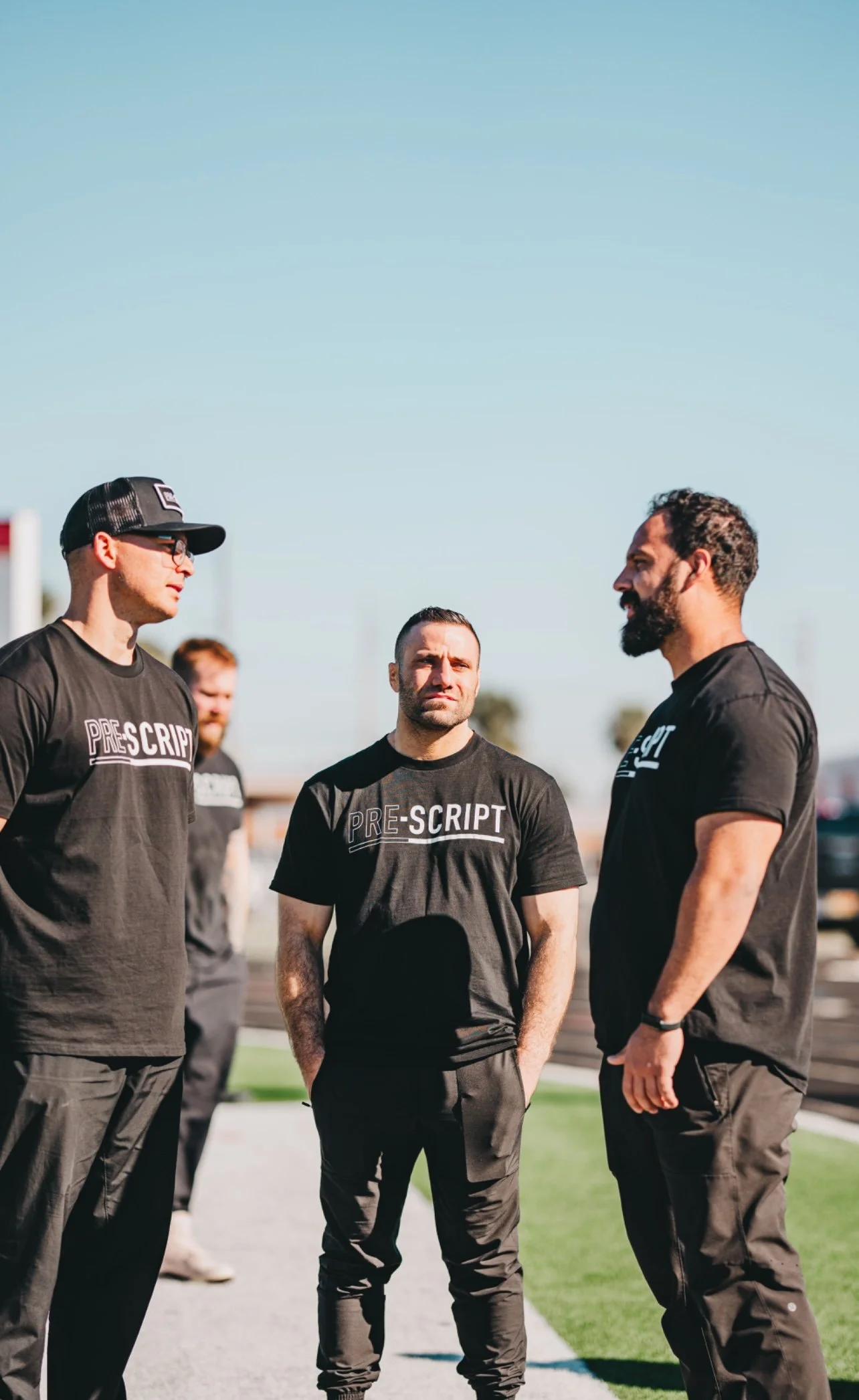 Anton speaking with other Pre-script coaches