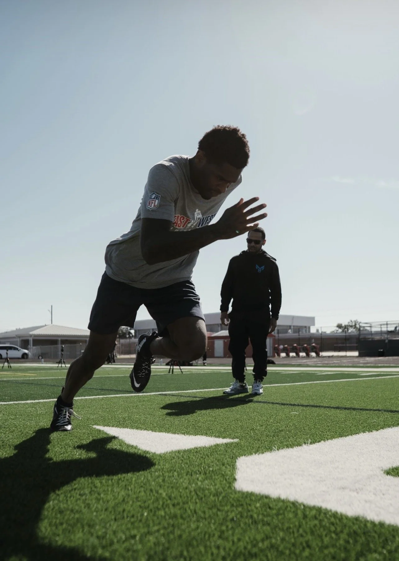 An HPC athlete sprinting on a field