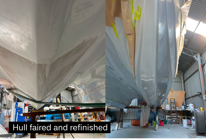 Side view of a boat hull inside a workshop, showing the hull faired and refined with a smooth surface, surrounded by tools and equipment.