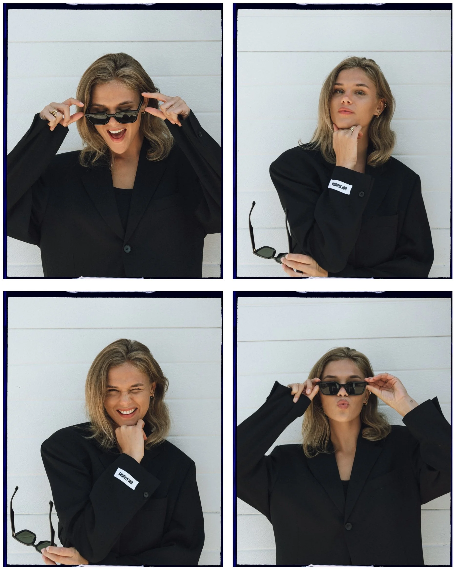 A woman in a black suit poses with different facial expressions and gestures in four separate images. In the first image, she is smiling broadly and wearing sunglasses. In the second, she is holding her chin with one hand, looking confident. In the third, she is smiling with her eyes closed and a hand on her chin. In the fourth, she is adjusting her sunglasses and pouting.