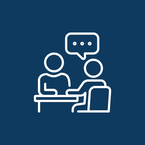 Line drawing of two people sitting across from each other at a table, having a conversation with a speech bubble containing ellipsis above them.