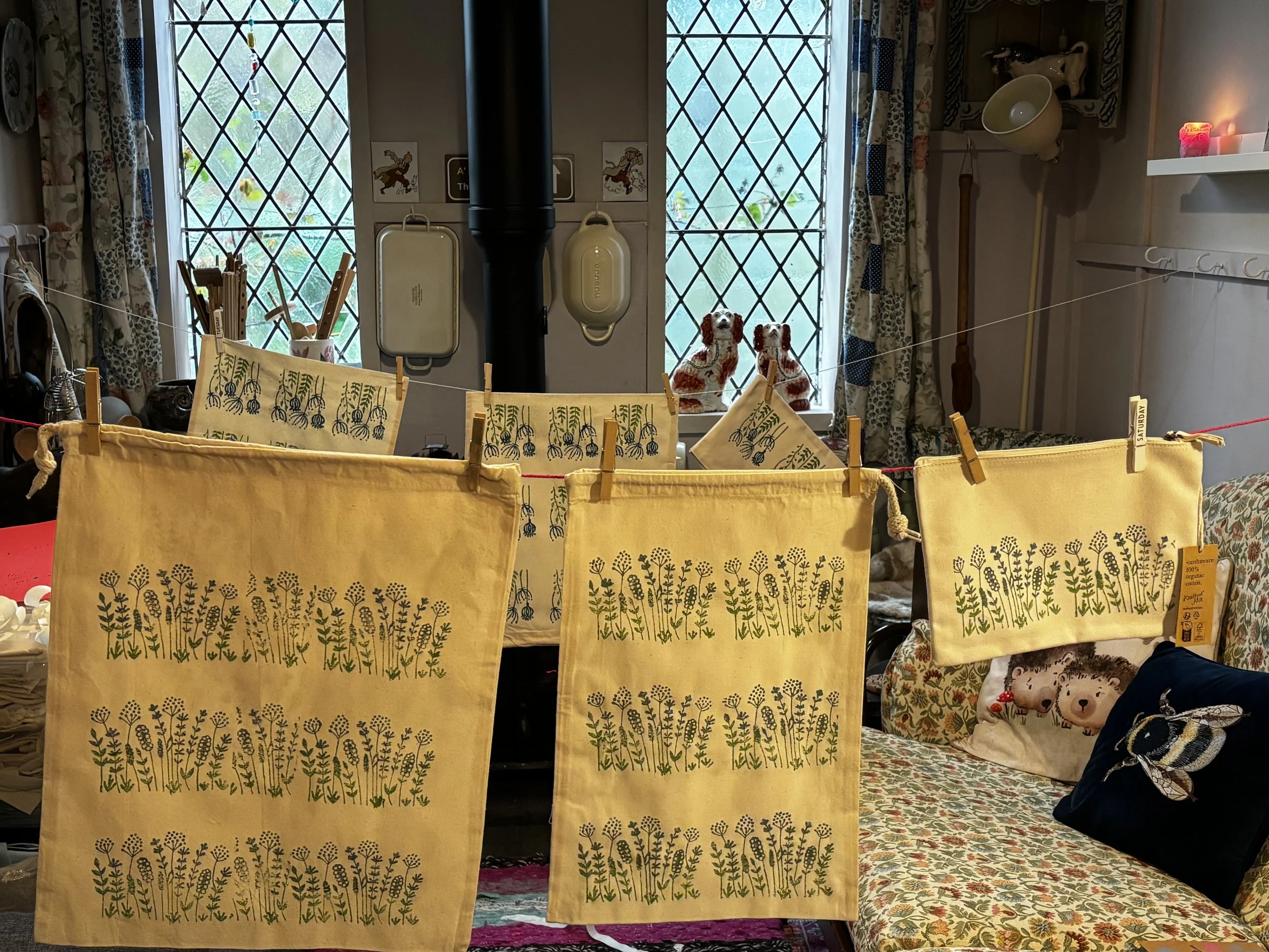 Freshly printed peces drying in the studio.