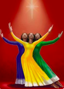 Three women dancing, dressed in traditional Indian attire in blue, yellow, and green, with arms raised against a red background and a bright light shining down.