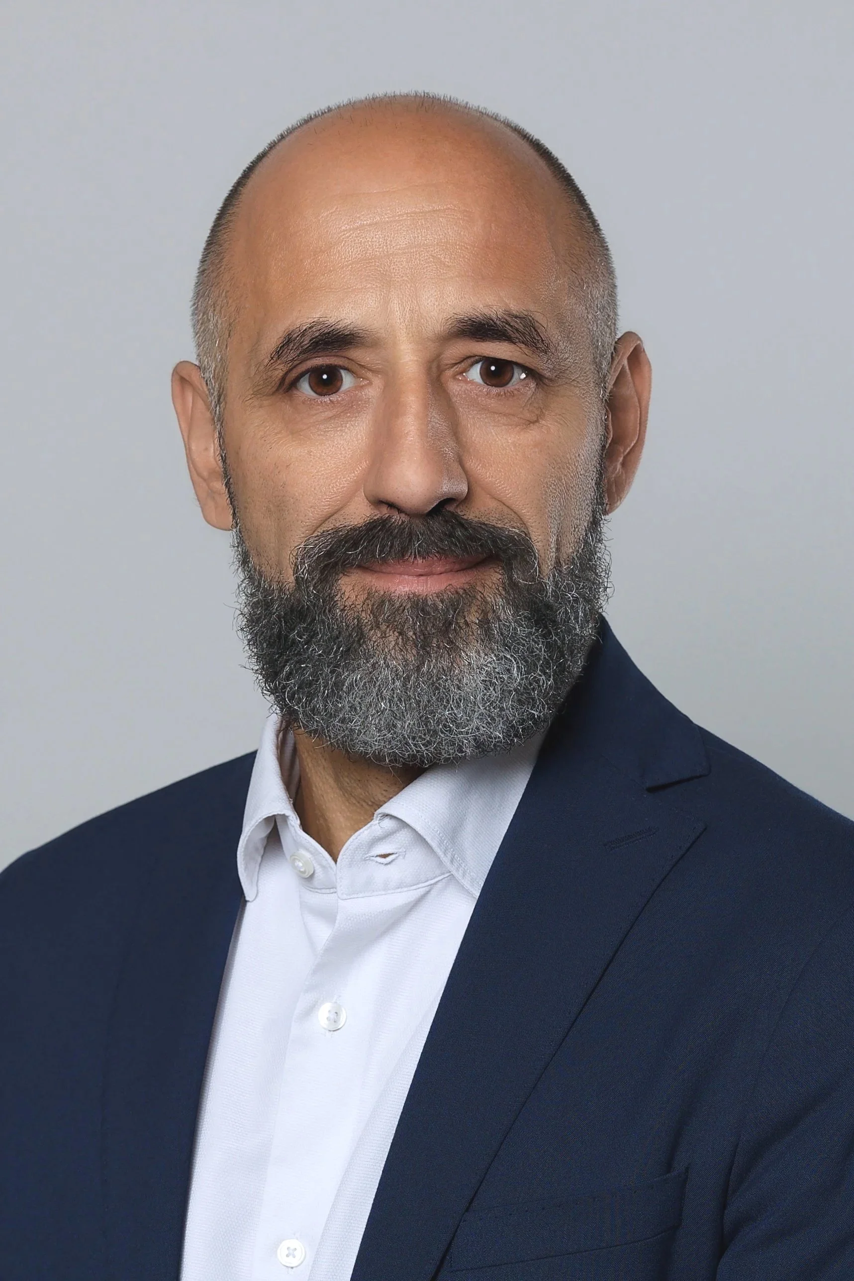 Portrait corporate dirigeant Genève headshot professionnel homme Alain Grivel