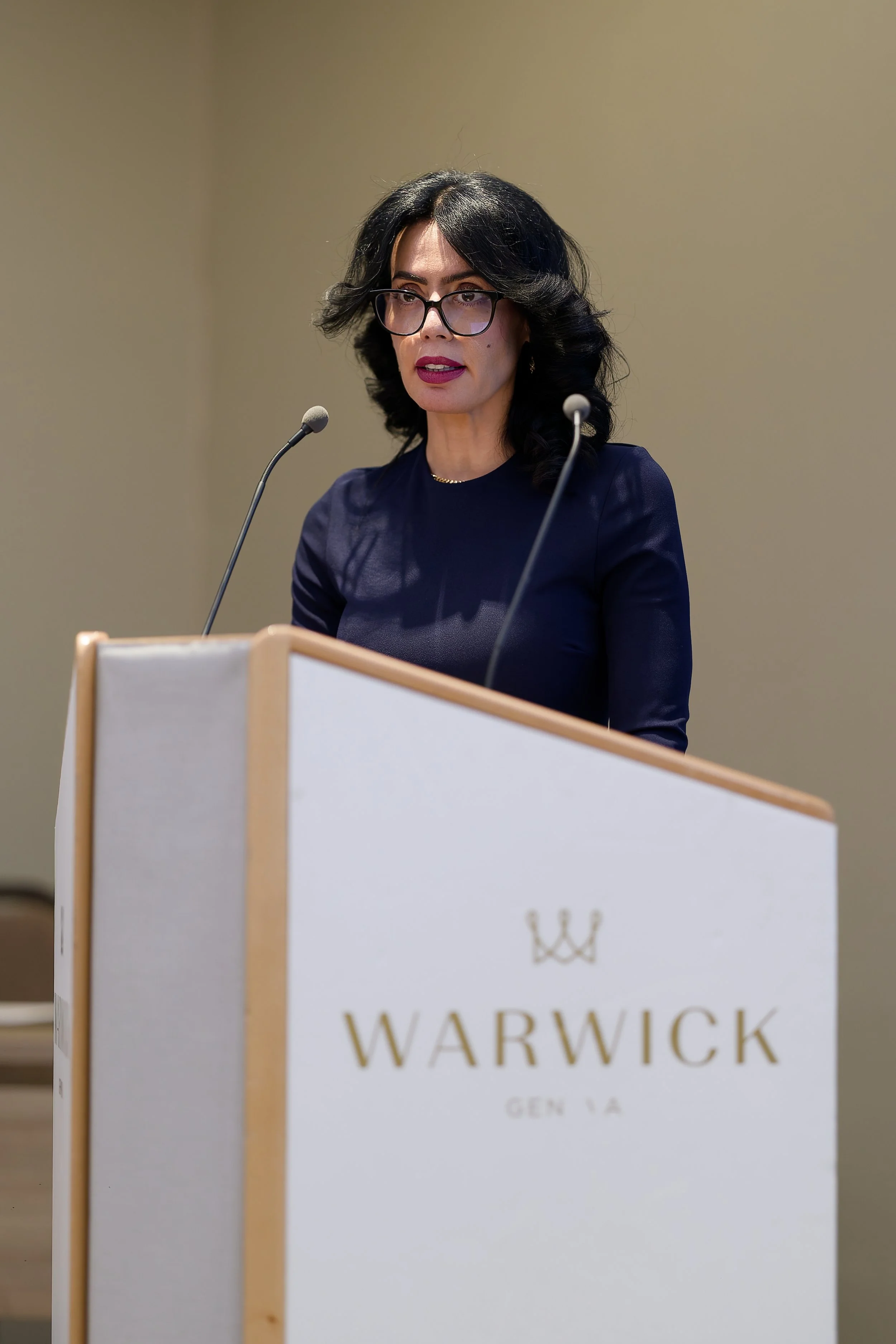 Photographe conférence Genève intervenante événement corporate Alain Grivel