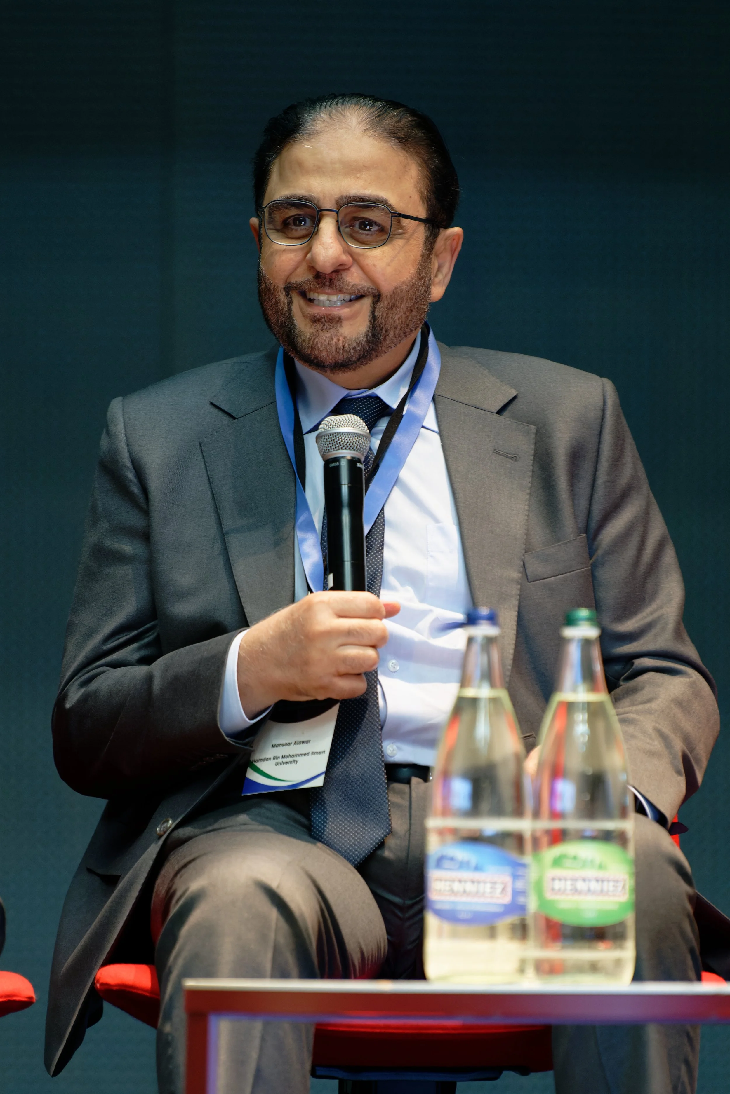 Photographe panel conférence entreprise Genève speaker corporate Alain Grivel