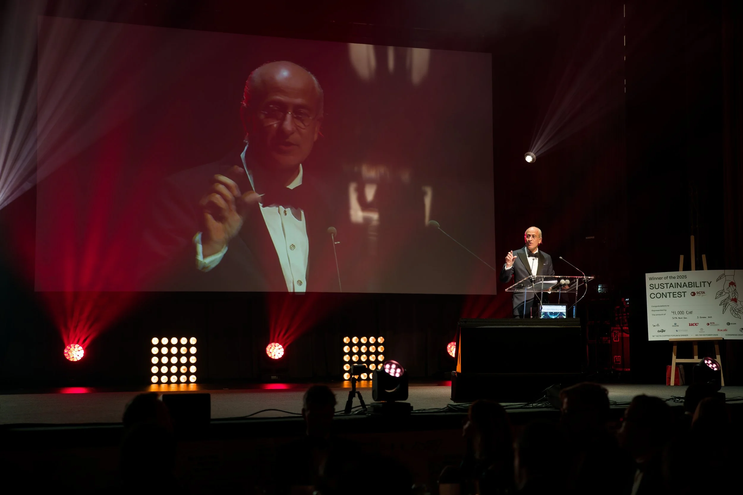 Photographe remise de prix entreprise Genève événement corporate scène Alain Grivel