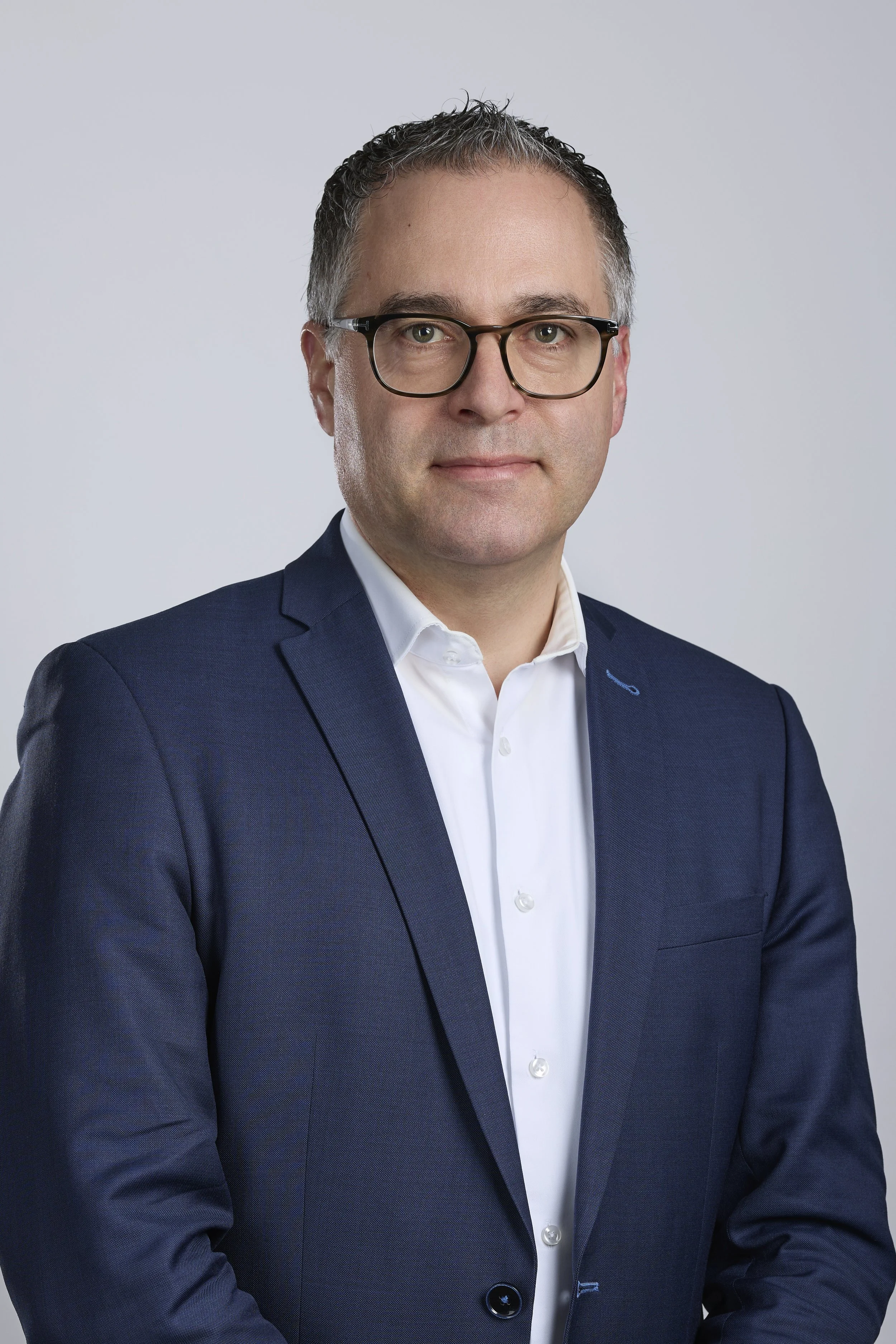 Portrait corporate dirigeant Genève headshot professionnel Alain Grivel