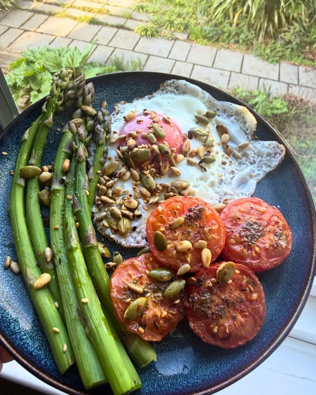 Toast is optional.

Especially when spring starts doing its thing.

This took about five minutes, used what was already in the fridge, and felt a lot more interesting than defaulting to the usual. A few tomatoes in the air fryer, asparagus in the mic