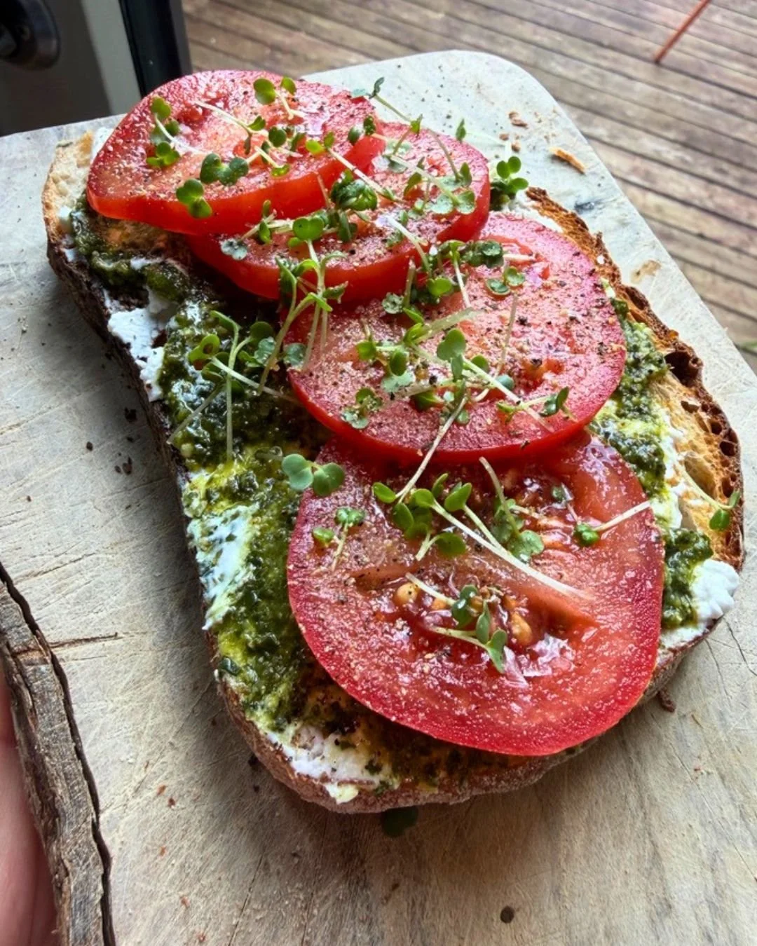 Breakfast doesn&rsquo;t have to be sad

Sourdough with ricotta, pesto, tomatoes and rocket sprouts, one of those breakfasts that&rsquo;s genuinely worth making while tomatoes are actually sweet and in season. Roughly 12g protein and a decent hit of f