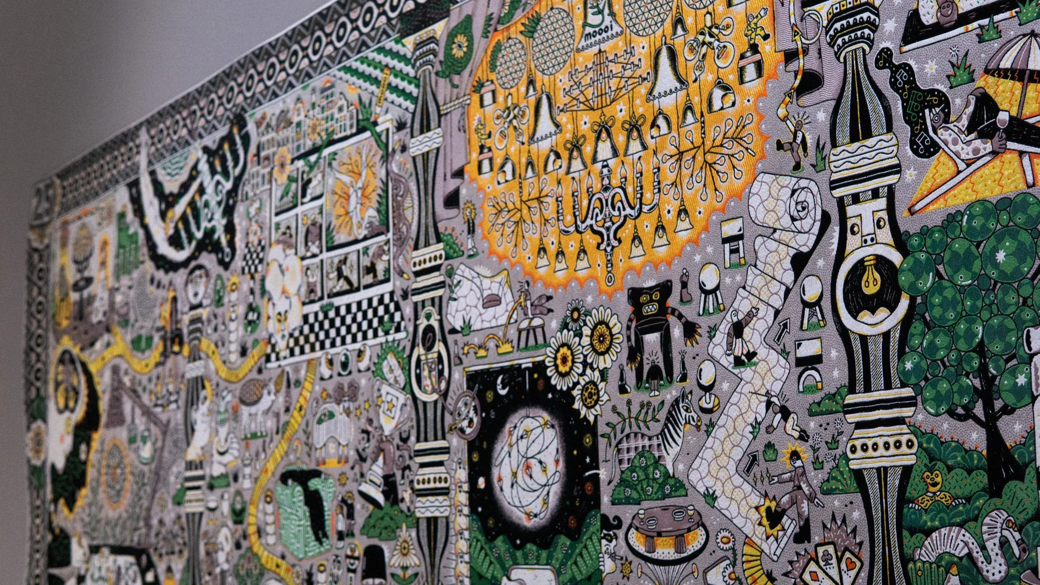 Colorful, illustrated mural with various whimsical and abstract designs, including animals, flowers, and geometric shapes.  Tapestry and jacquard weaving art