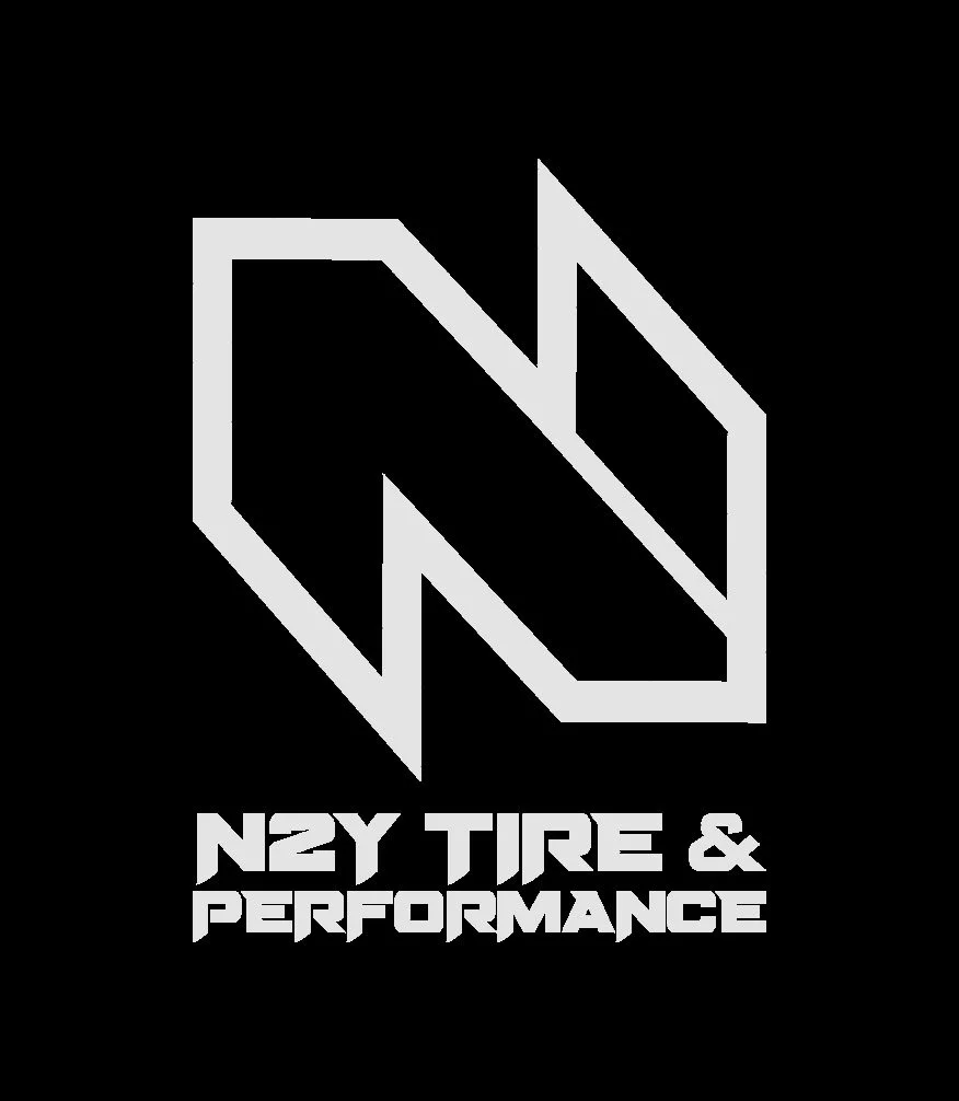 Logo for N2Y Tire & Performance featuring a stylized geometric design and the company name in bold letters.