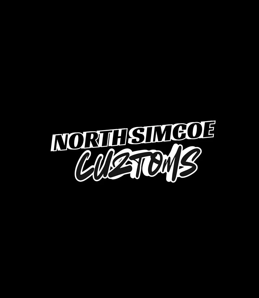 Logo for North Isle Moe Customs with bold, stylized text on a black background.