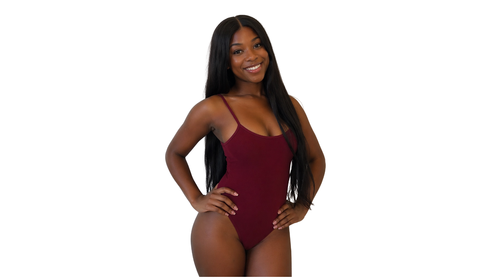 "Melanated woman in burgundy bodysuit showcasing smooth skin, representing intimate skincare treatments, Brazilian waxing, and hyperpigmentation services.”
