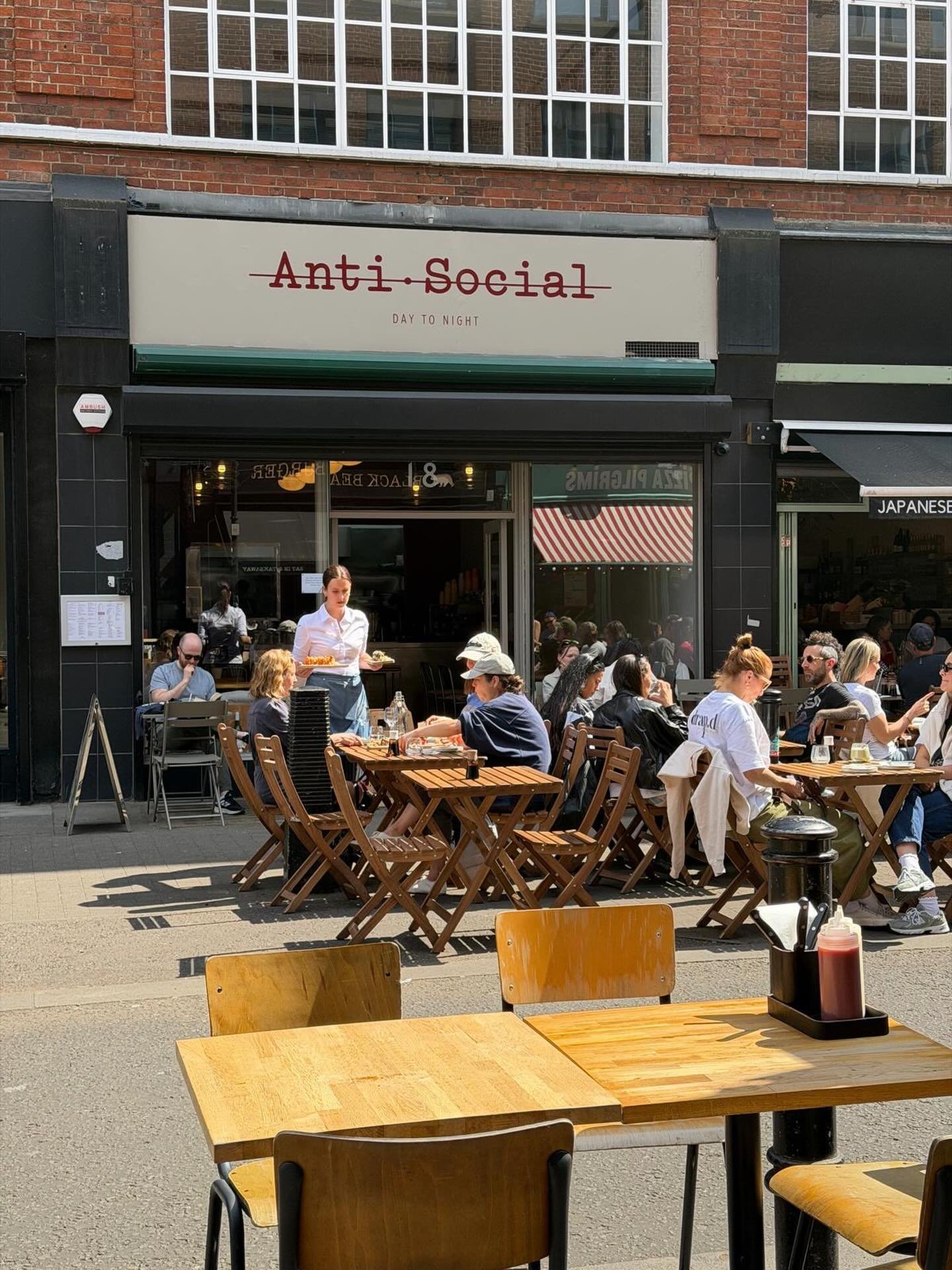 Anti Social, but somehow everyone&rsquo;s here. ☀️
Day to night energy, full tables, no rush &mdash; just how it should be.

#antisocial #exmouthmarket #londoncafe #londonbrunch #outdoorseating sunnydays londonfood brunchvibes coffeetime daytonight l