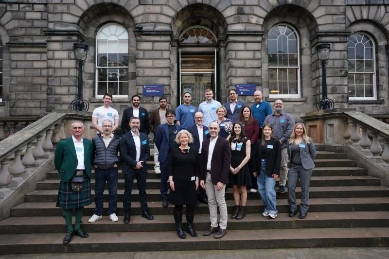 University of Edinburgh AI Accelerator cohort standing on stairs outside