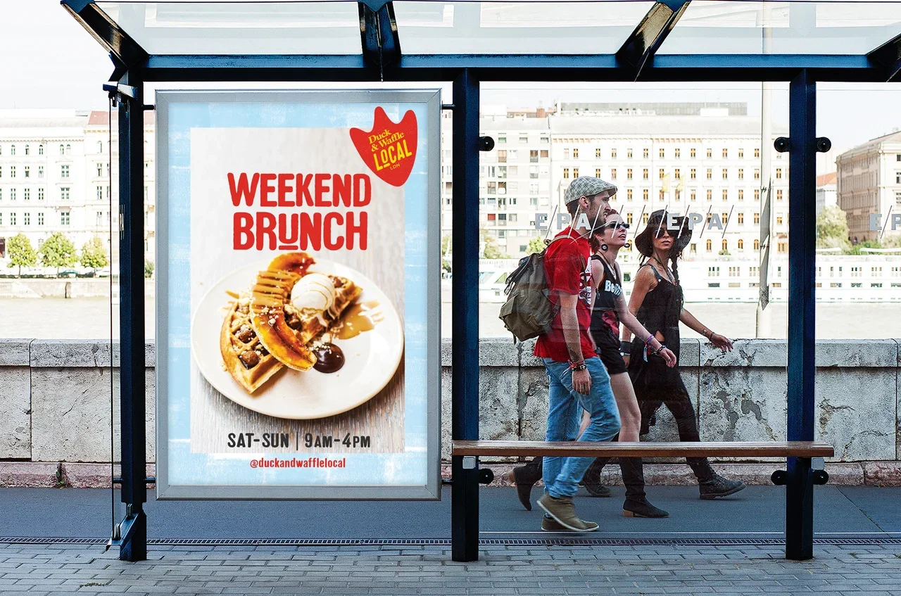 Bus stop advertisement for weekend brunch featuring waffles with ice cream and toppings, open Saturday and Sunday from 9 am to 4 pm.
