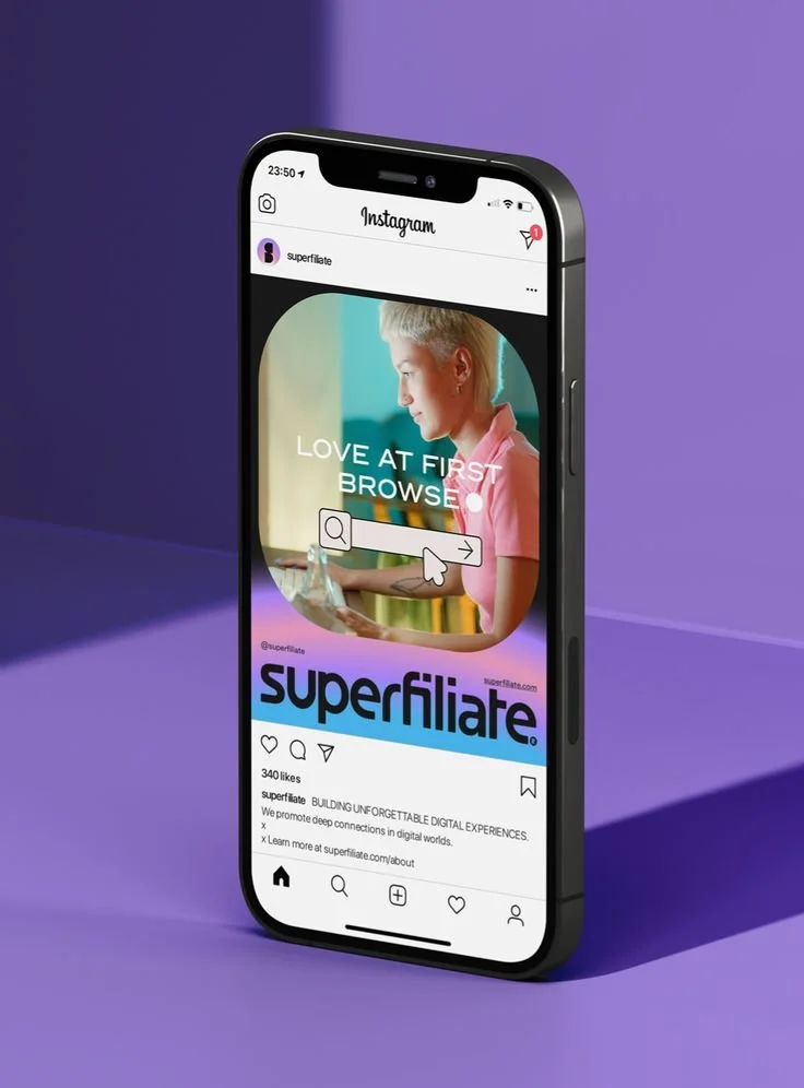 Smartphone displaying an Instagram post about Superfilate, featuring a young woman with short blonde hair working on a laptop, with an overlay of text that reads "Love at First Browse," and a search bar with a cursor.