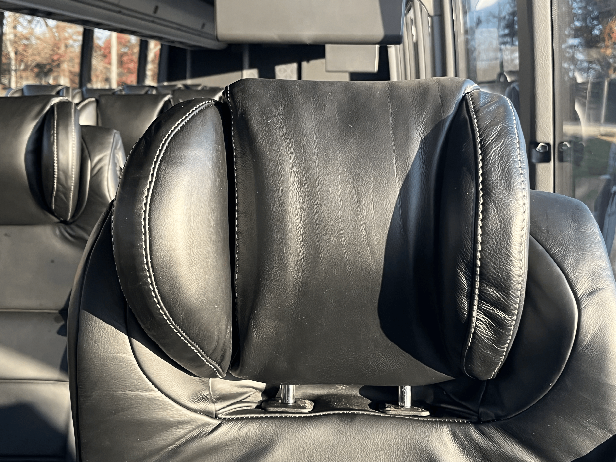 first class bus head-rest.png