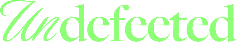The word "Undefeeted" written in green, stylized script font on a white background.