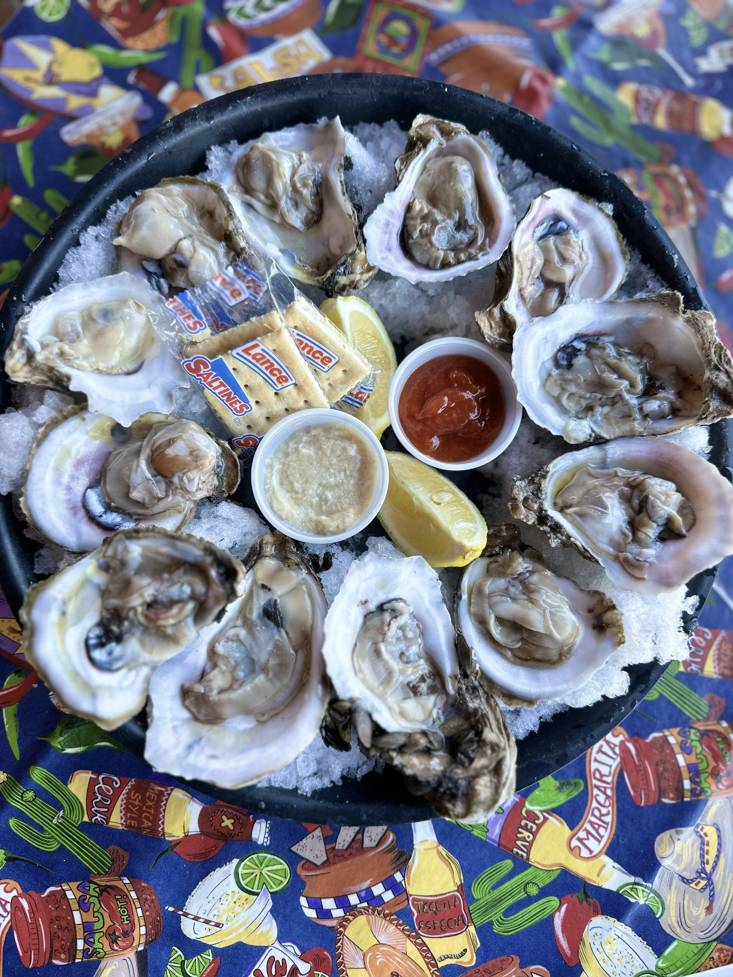 fresh gulf coast oysters with cocktail sauce, horseradsh and Lance crackers order by the half dozen or dozen