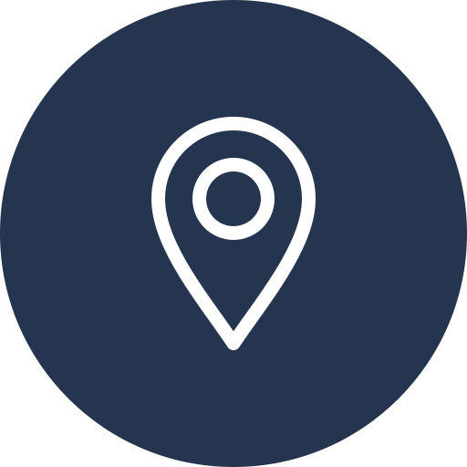 A location pin icon on a dark blue circular background.