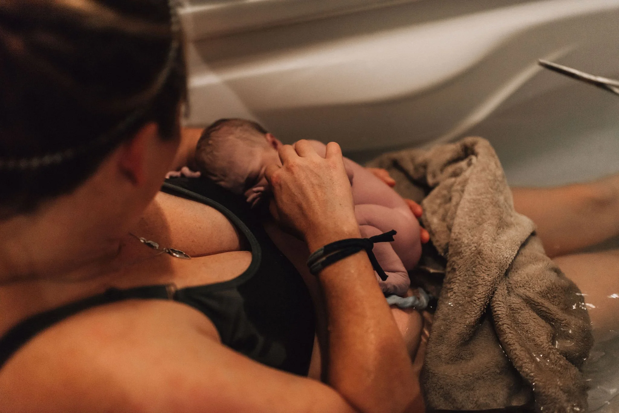 Home water birth with midwife support in Temecula California