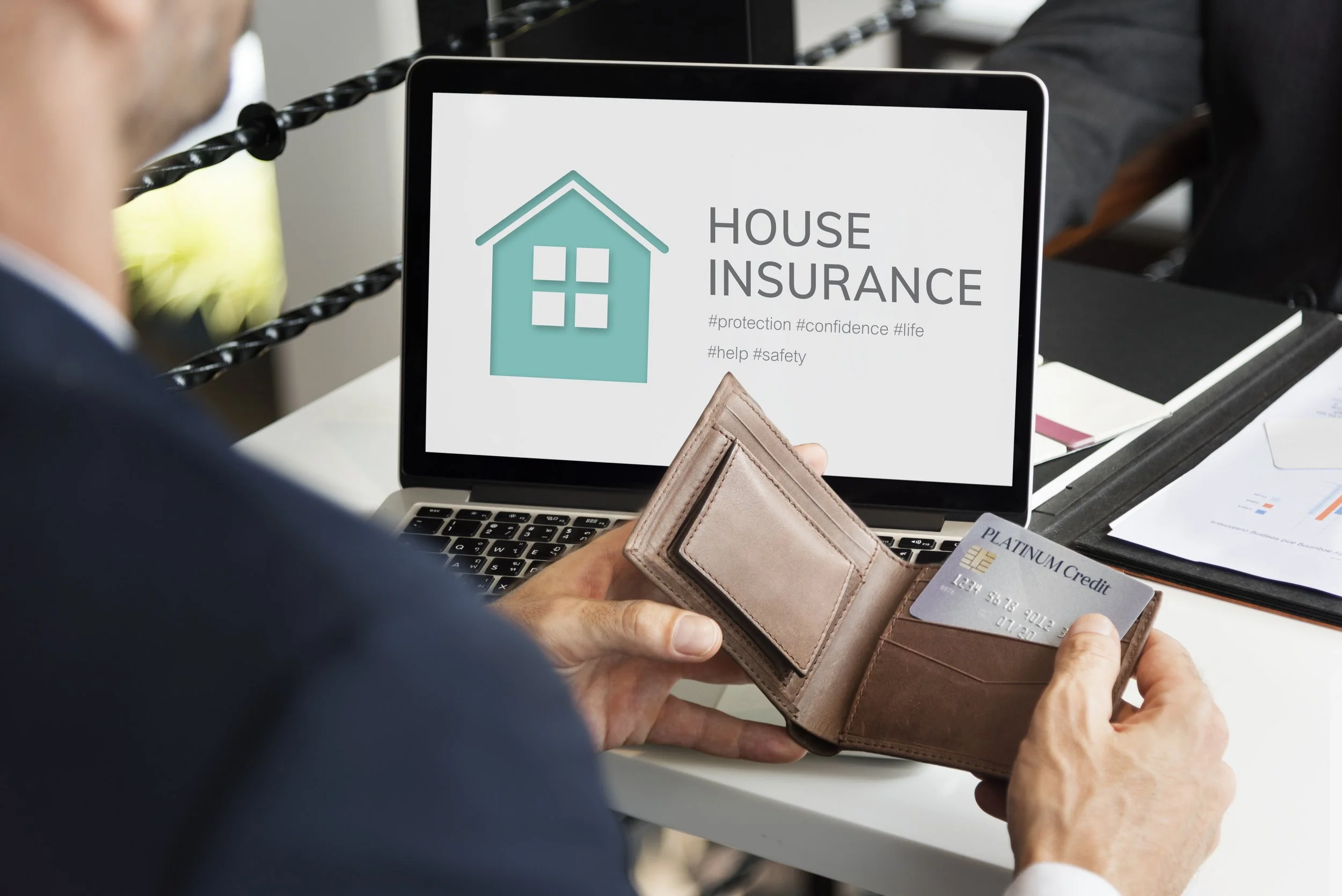 businessman-house-insurance.jpg