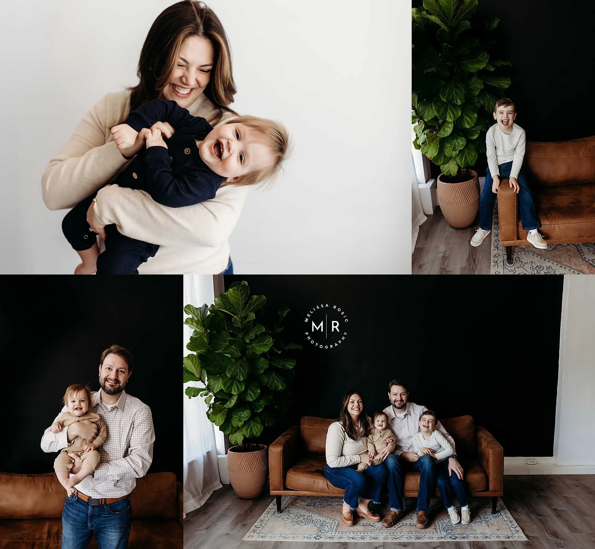 Mother holding laughing toddler and family sitting on couch smiling