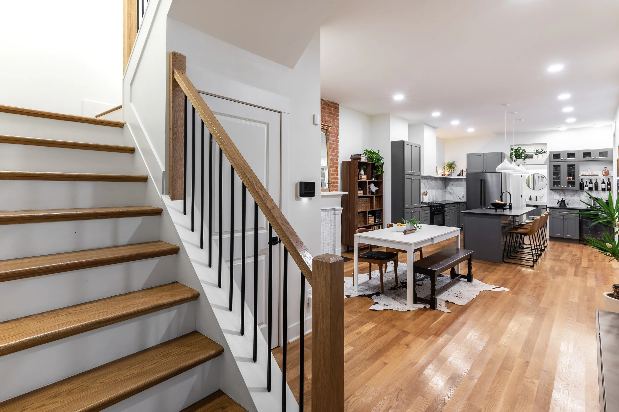 Whole home remodel with open staircase and kitchen in Greater Cincinnati by Shade Tree Homes