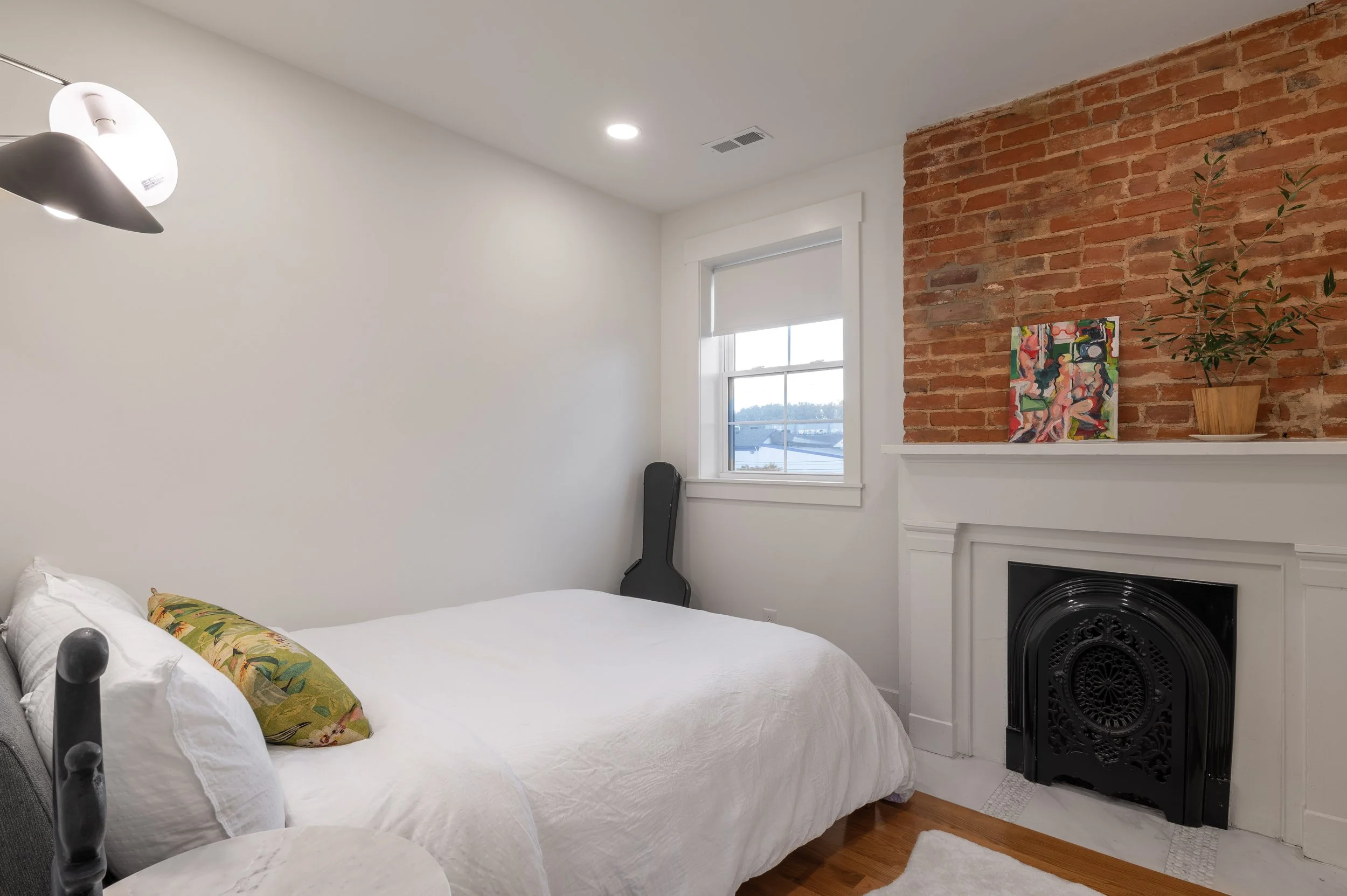 Guest bedroom in historic Covington Kentucky home remodel by Shade Tree Homes